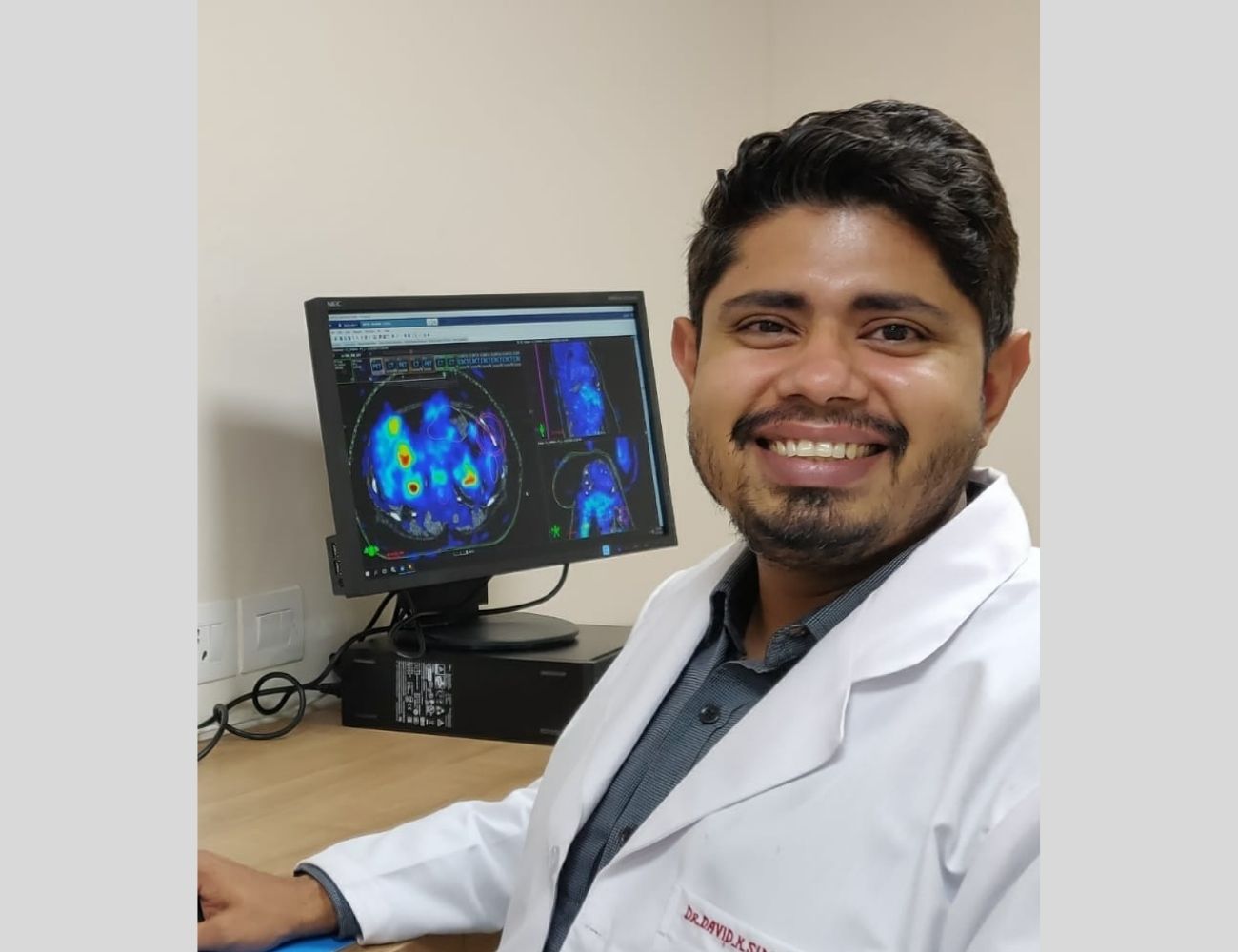 Dr. David K Simson