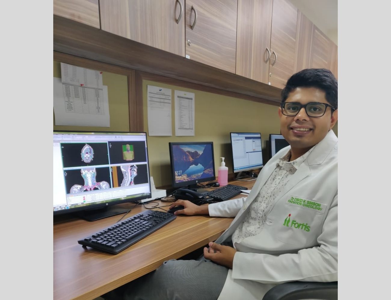 Dr. David K Simson